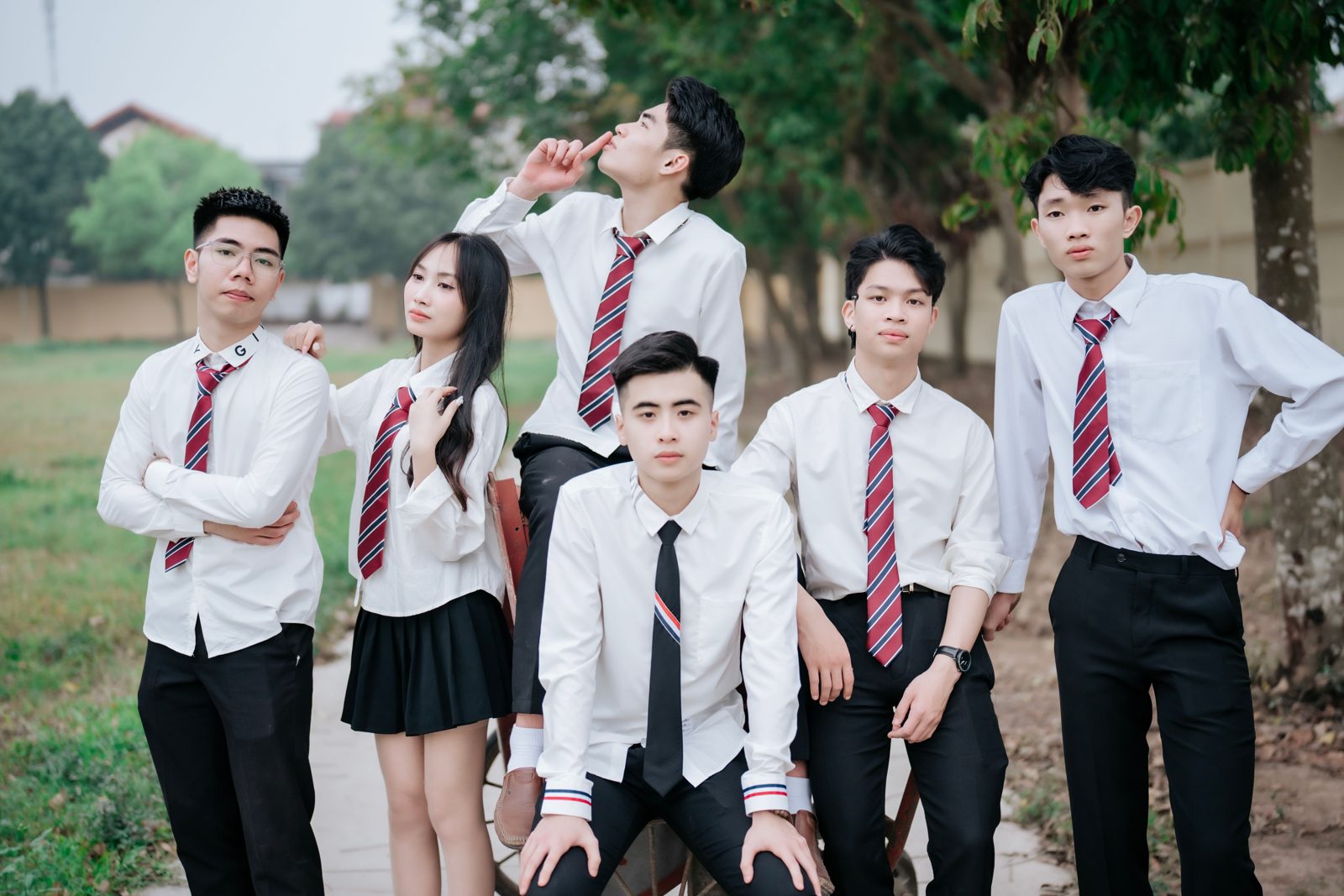 Students wearing school uniforms outdoors